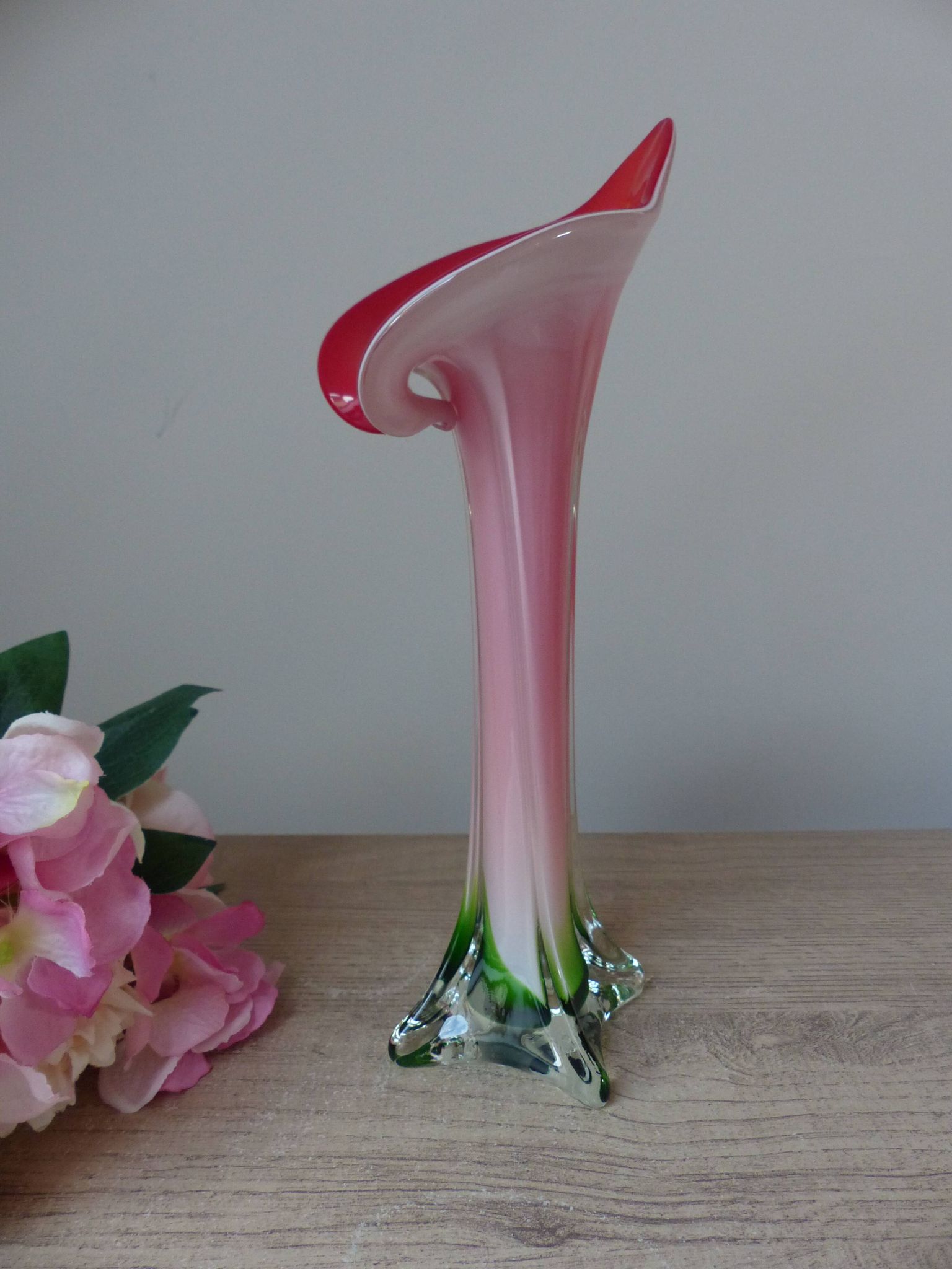 Vintage coloured blown glass vase in the shape of a calla lily.
