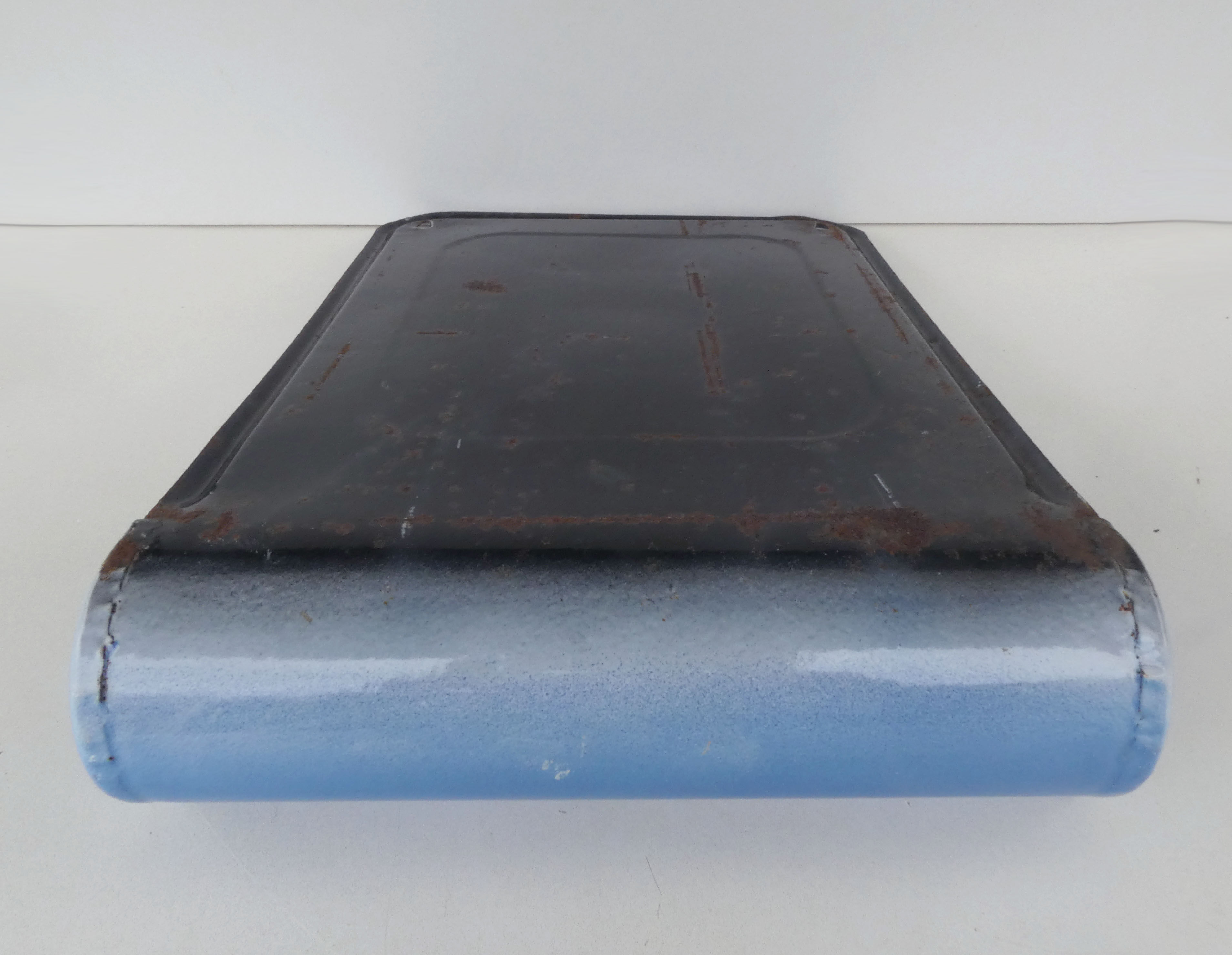 old blue enamelled steel utensil drainer