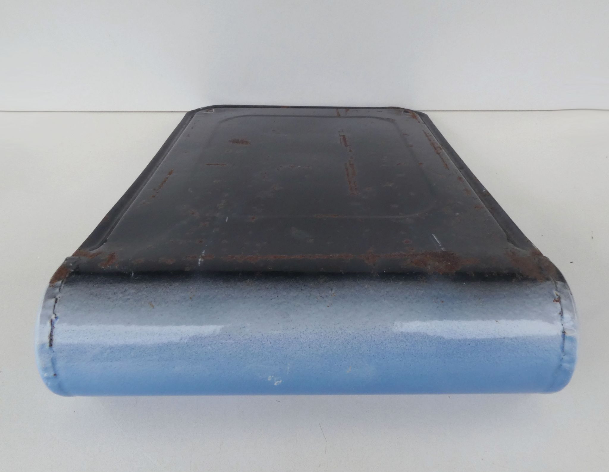 old blue enamelled steel utensil drainer