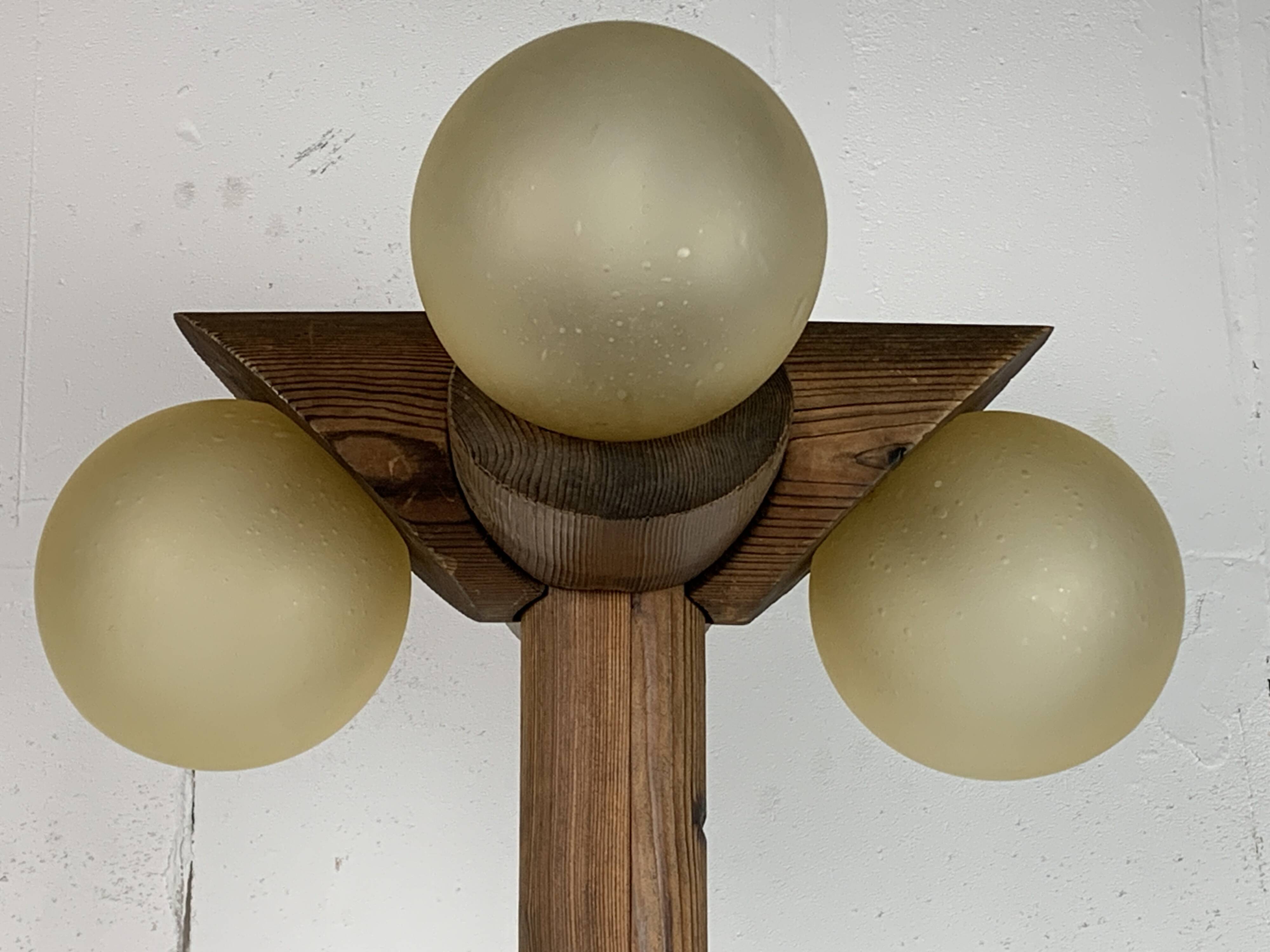 Midcentury brutalist oak floor lamp with 4 spheres, 1970s  by Temde Leuchten