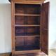 Louis XIII oak wardrobe, bonnetière, 18th century.