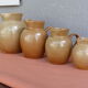Set of 4 pitchers, CNP, Grès Village France.
