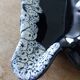 Black ceramic and foam shell ashtray