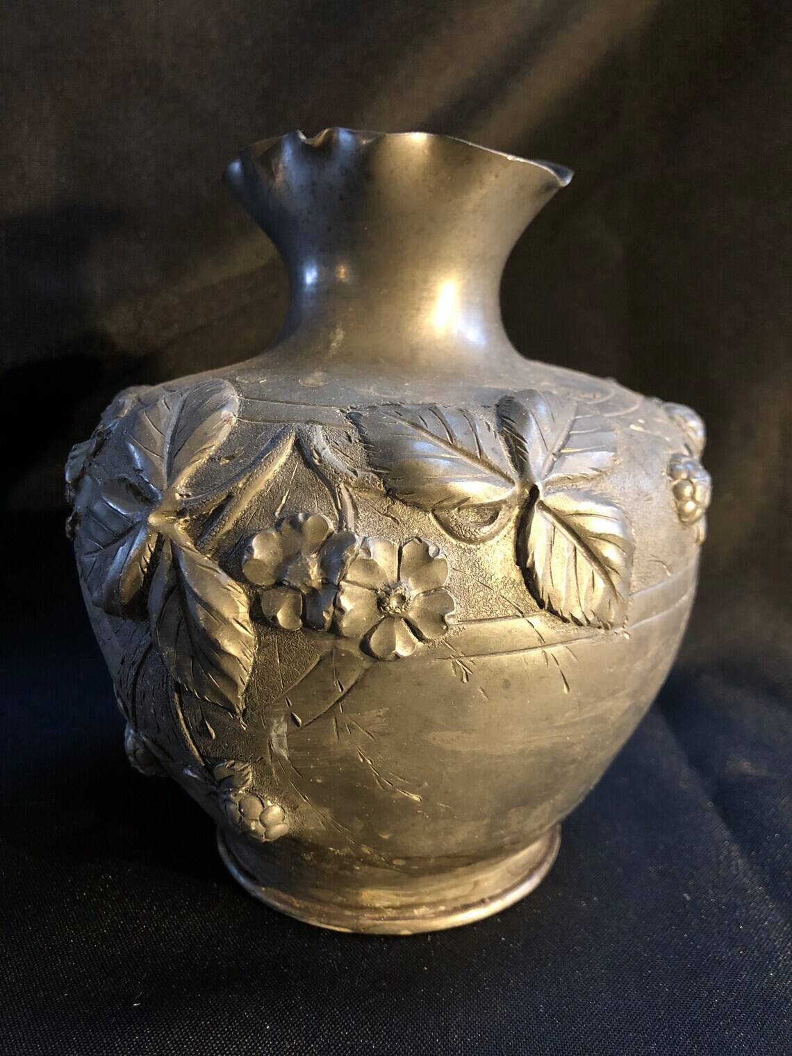 Embossed pewter vase with floral motifs 1930