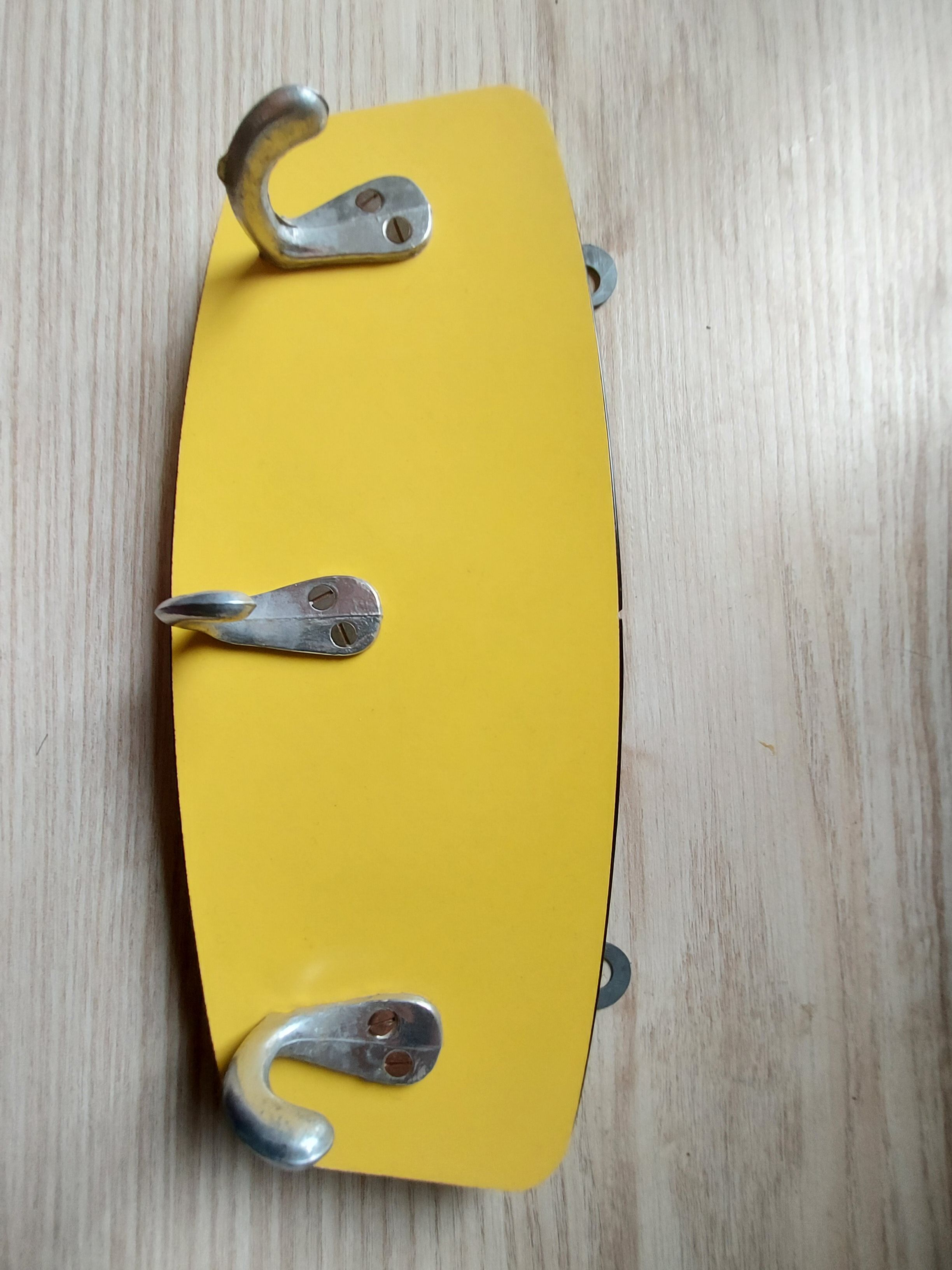 Yellow formica tea towel holder