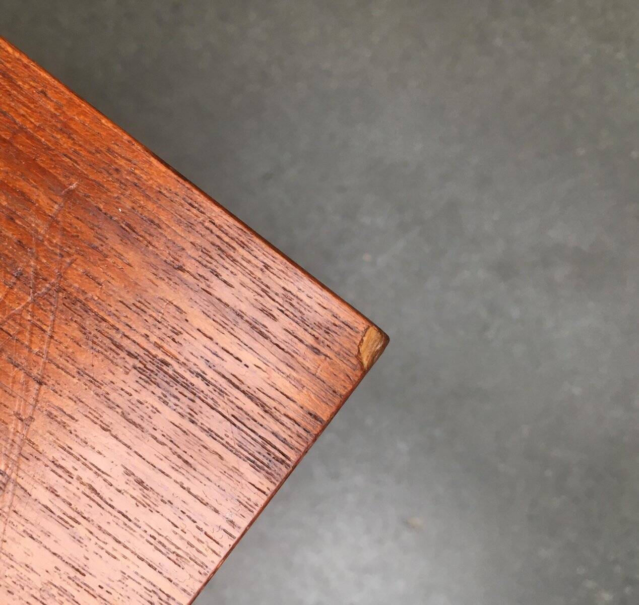 Mid-century teak side table with magazine rack.