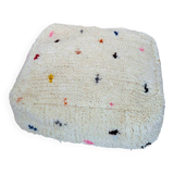 White square pouf cover with colorful polka dots