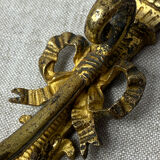 Patère en bronze, décor noeud