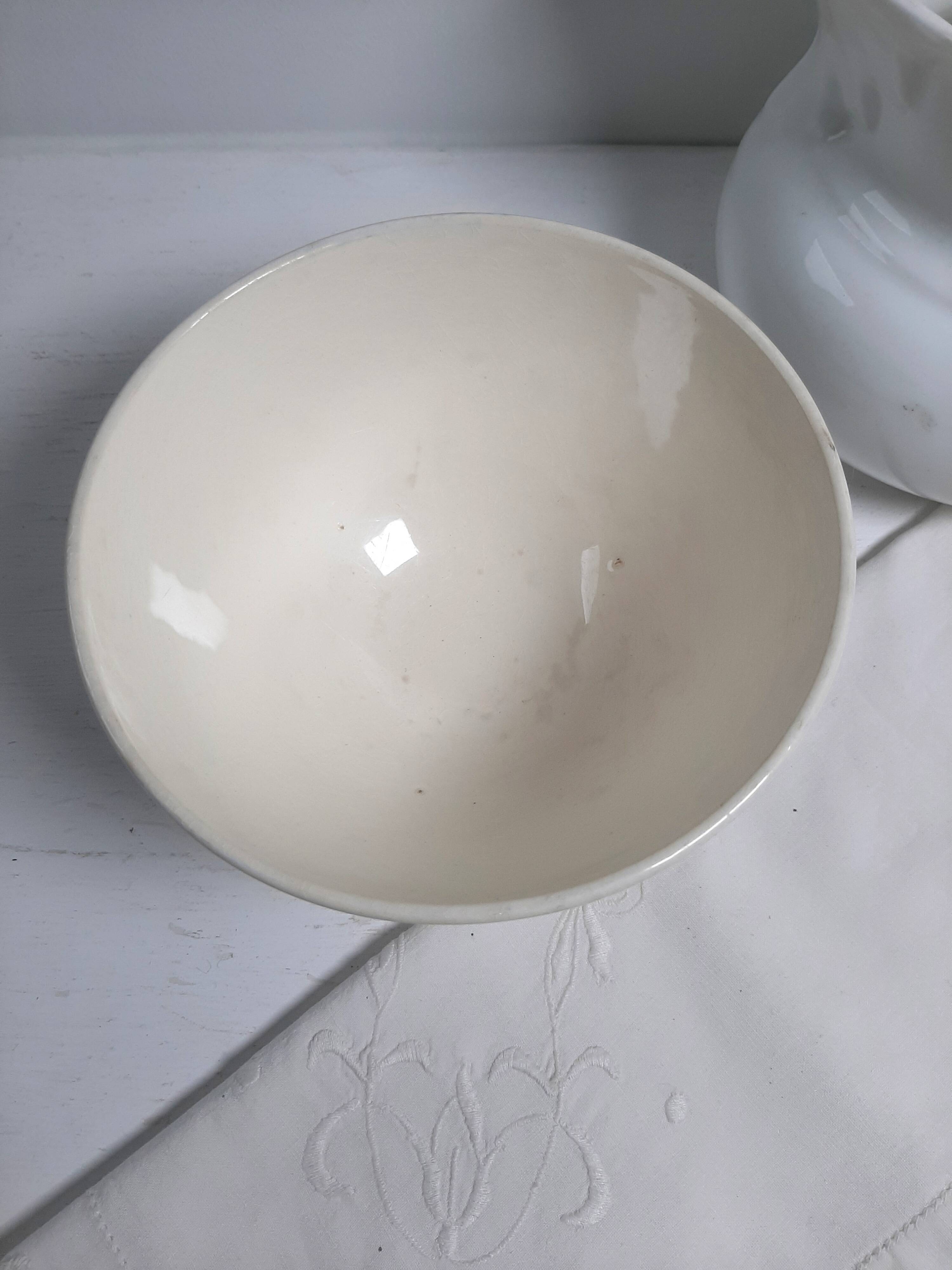 Vintage ironstone bowl from the Badonviller factory in cream and blue.
