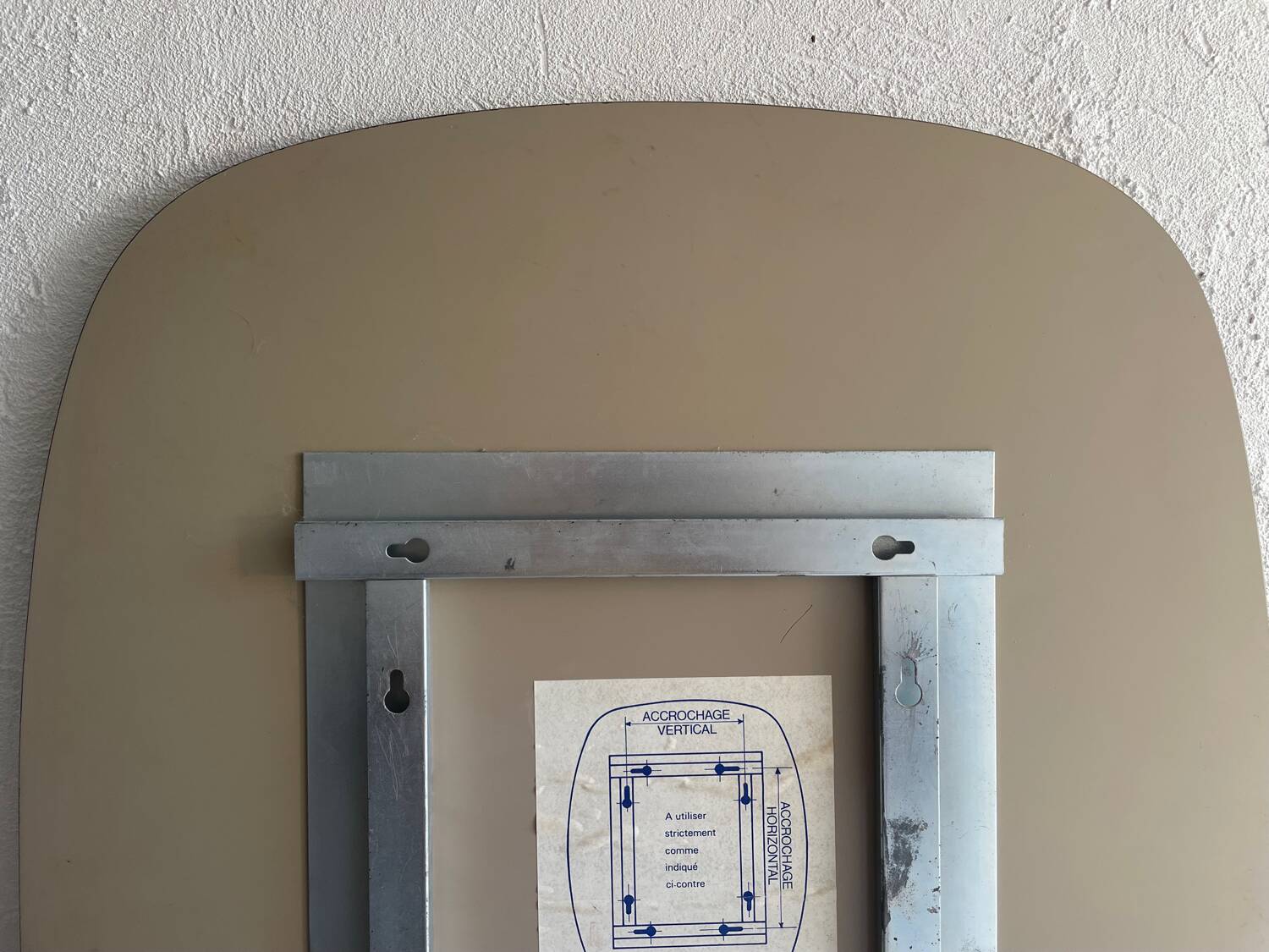 Miroir en verre fumé 70’s space age