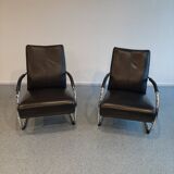 Pair of tubular armchairs