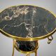 Gueridon tripod with gilded bronze frame covered with portor marble