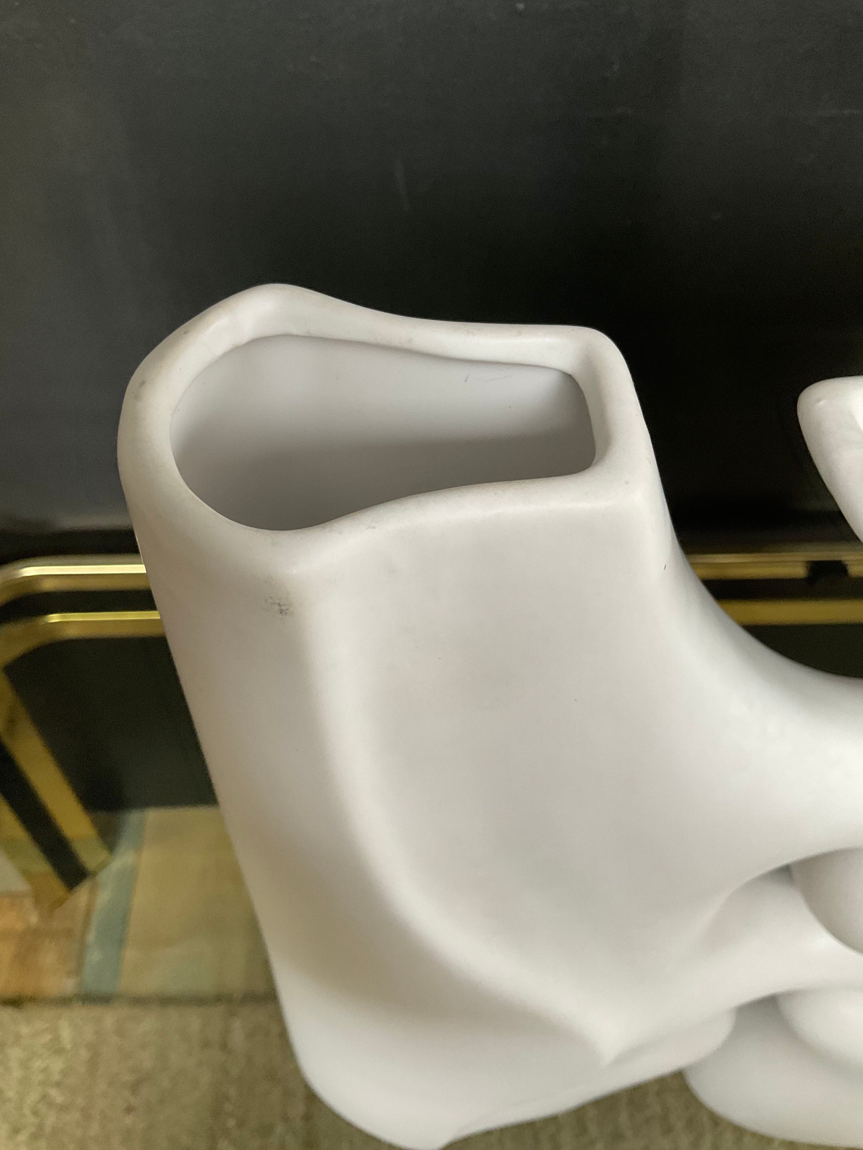 A pair of large designer ceramic vases.