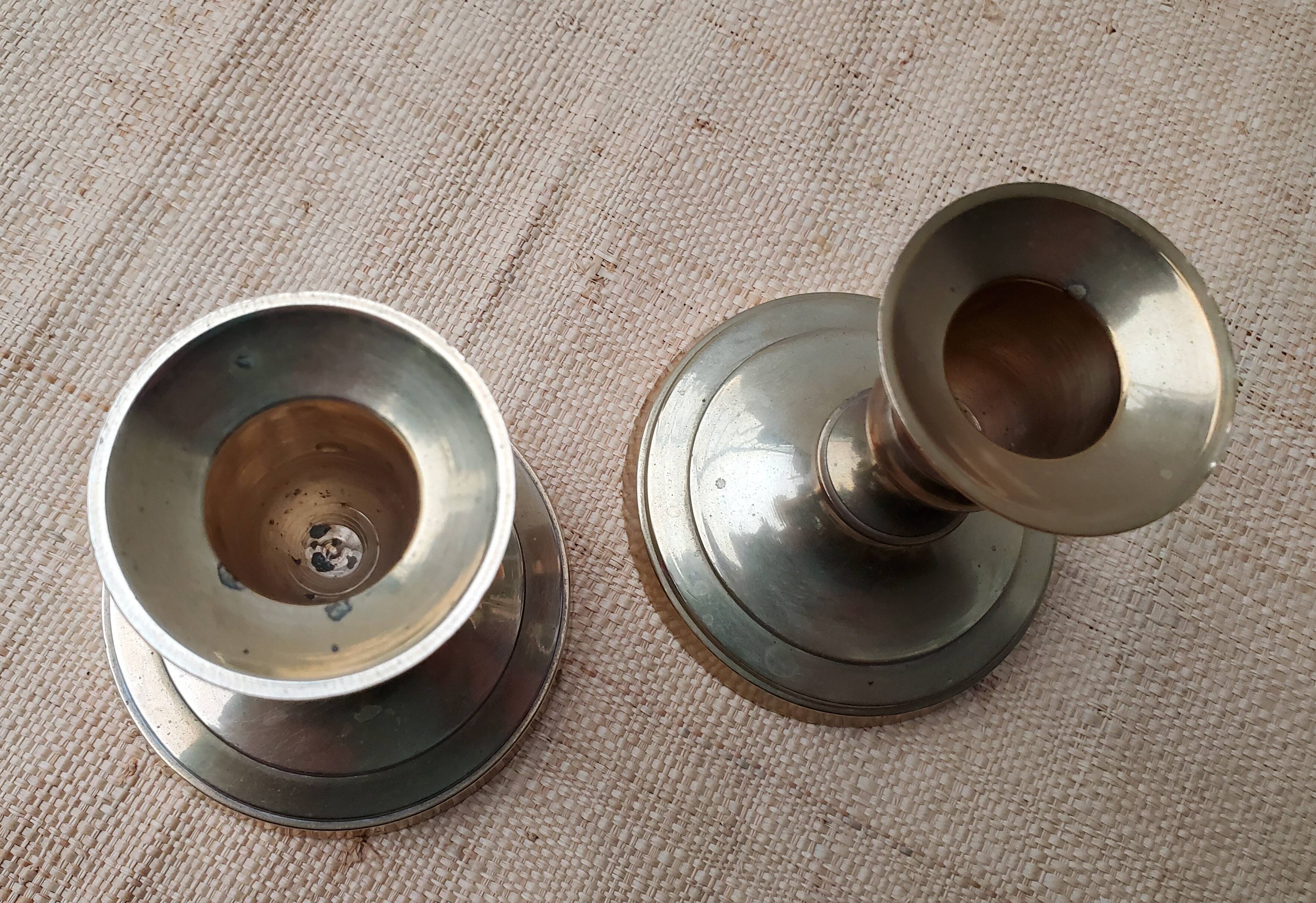 Duo of brass candlesticks