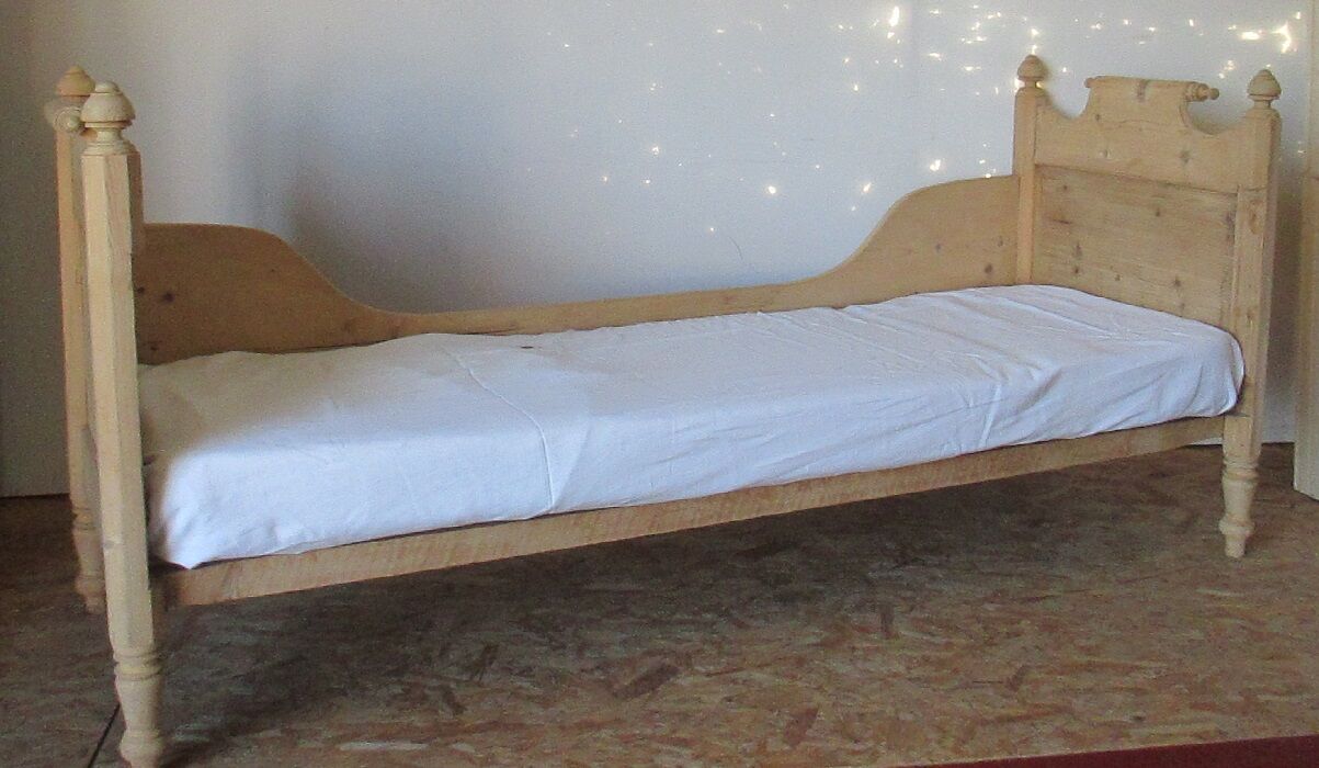 Retractable sofa bed of the Austrian Tyrole in natural wood