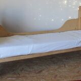 Retractable sofa bed of the Austrian Tyrole in natural wood