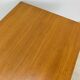 1950s modernist coffee table, wood and black metal.
