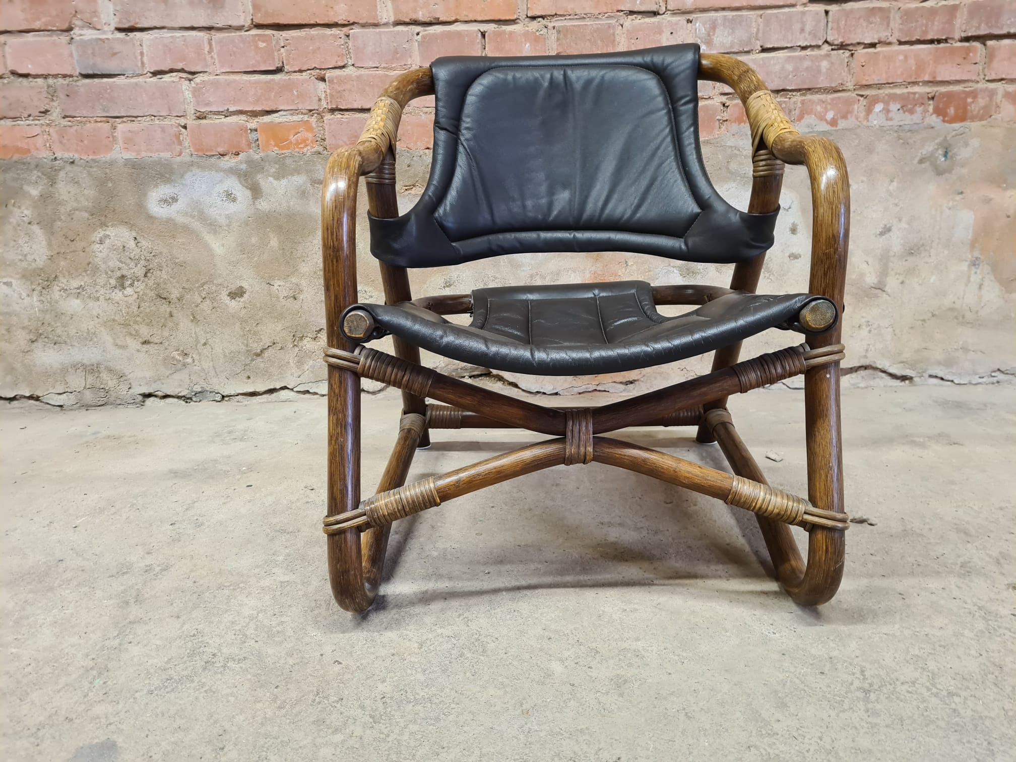 Pair of vintage skaï bamboo armchairs