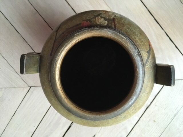 Treated terracotta vase