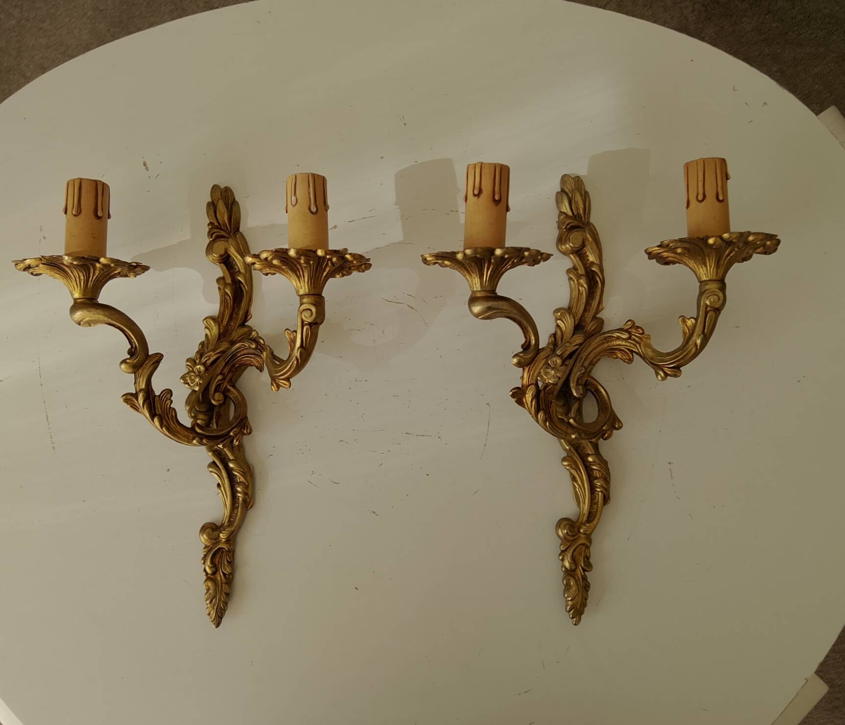 Pair of antique Rococo wall sconces in Louis XV style.
