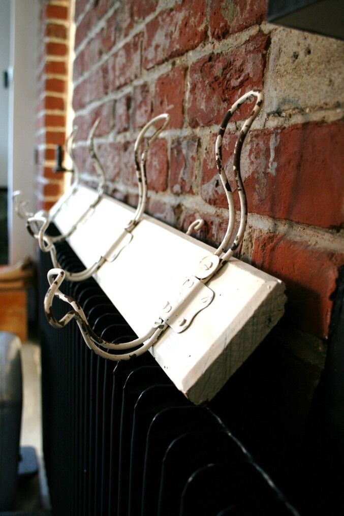 Metal and wood wall coat rack