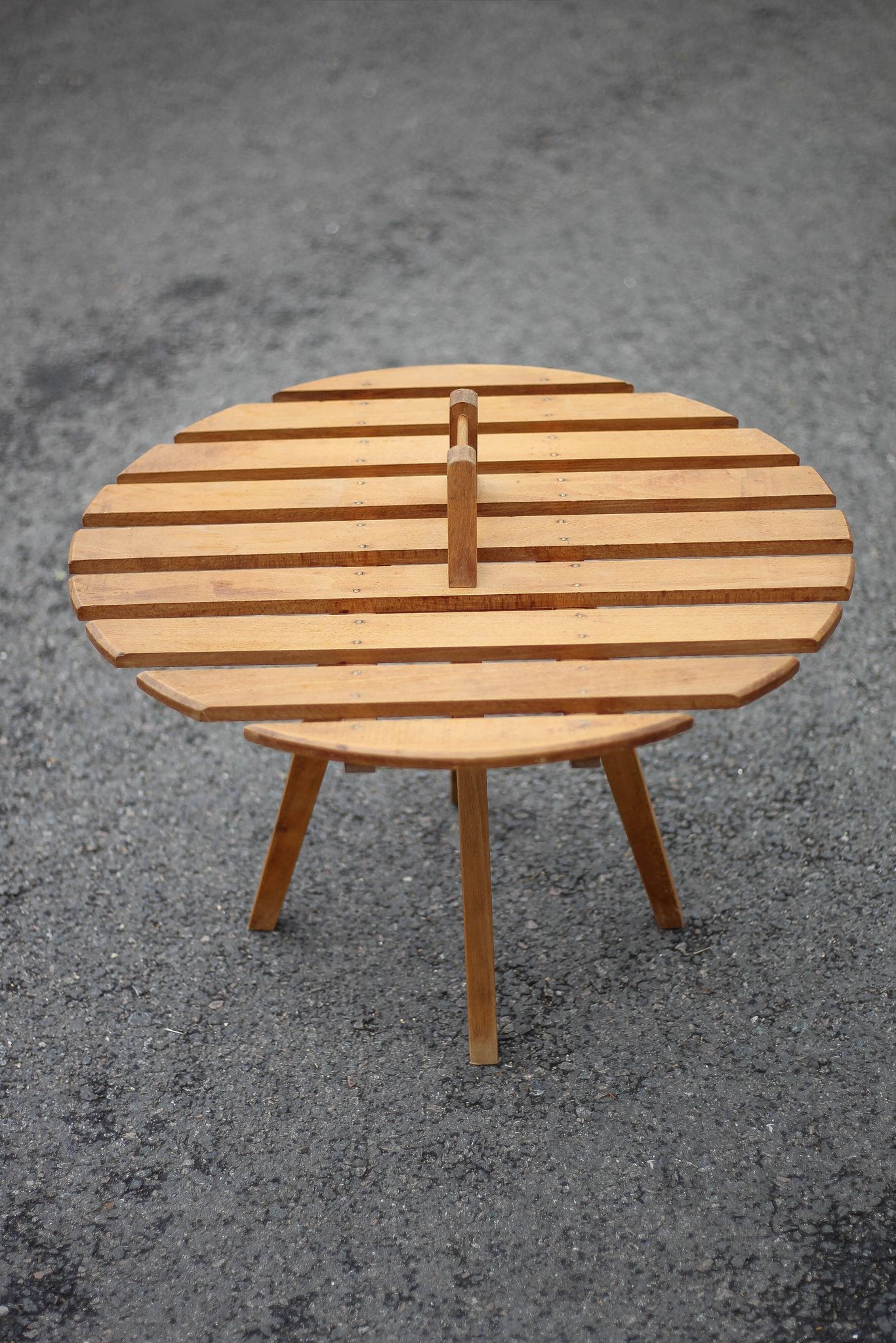 Vintage coffee table, wooden table with central handle, interior decoration, terrace, patio