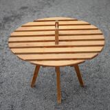 Vintage coffee table, wooden table with central handle, interior decoration, terrace, patio