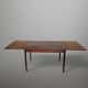 Scandinavian extendable dining table in teak