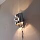 Space Age polished stainless steel wall light from the 1970s