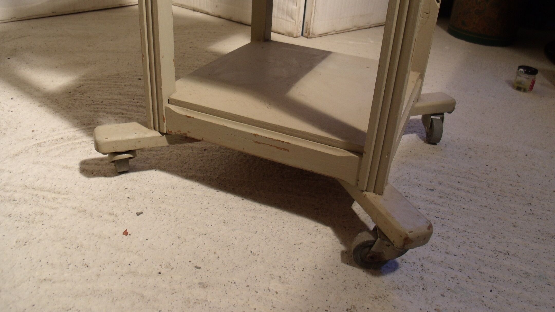 shabby wood side table on wheels
