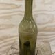 Bouteille ancienne verre verte forme libre