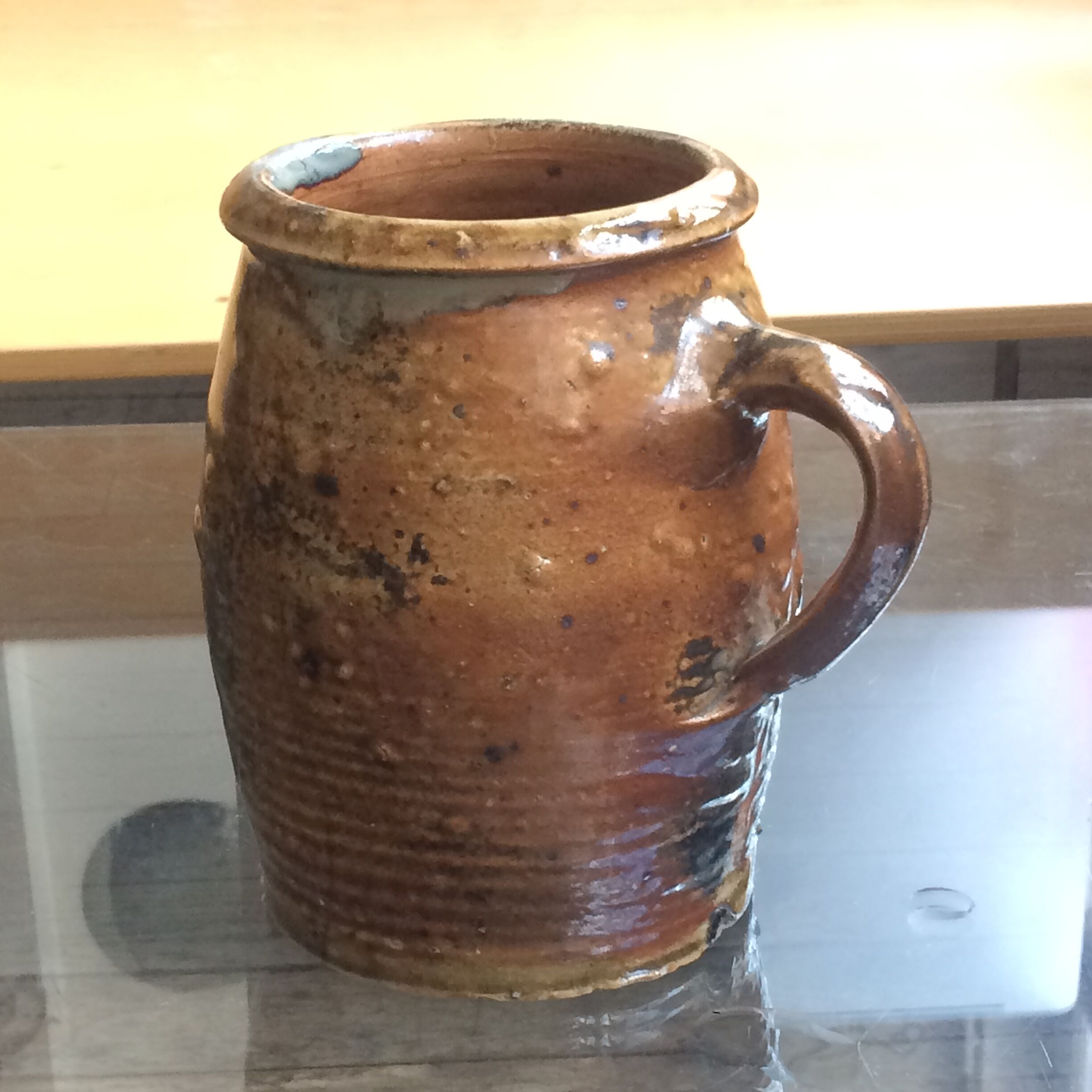Veneered earth jug
