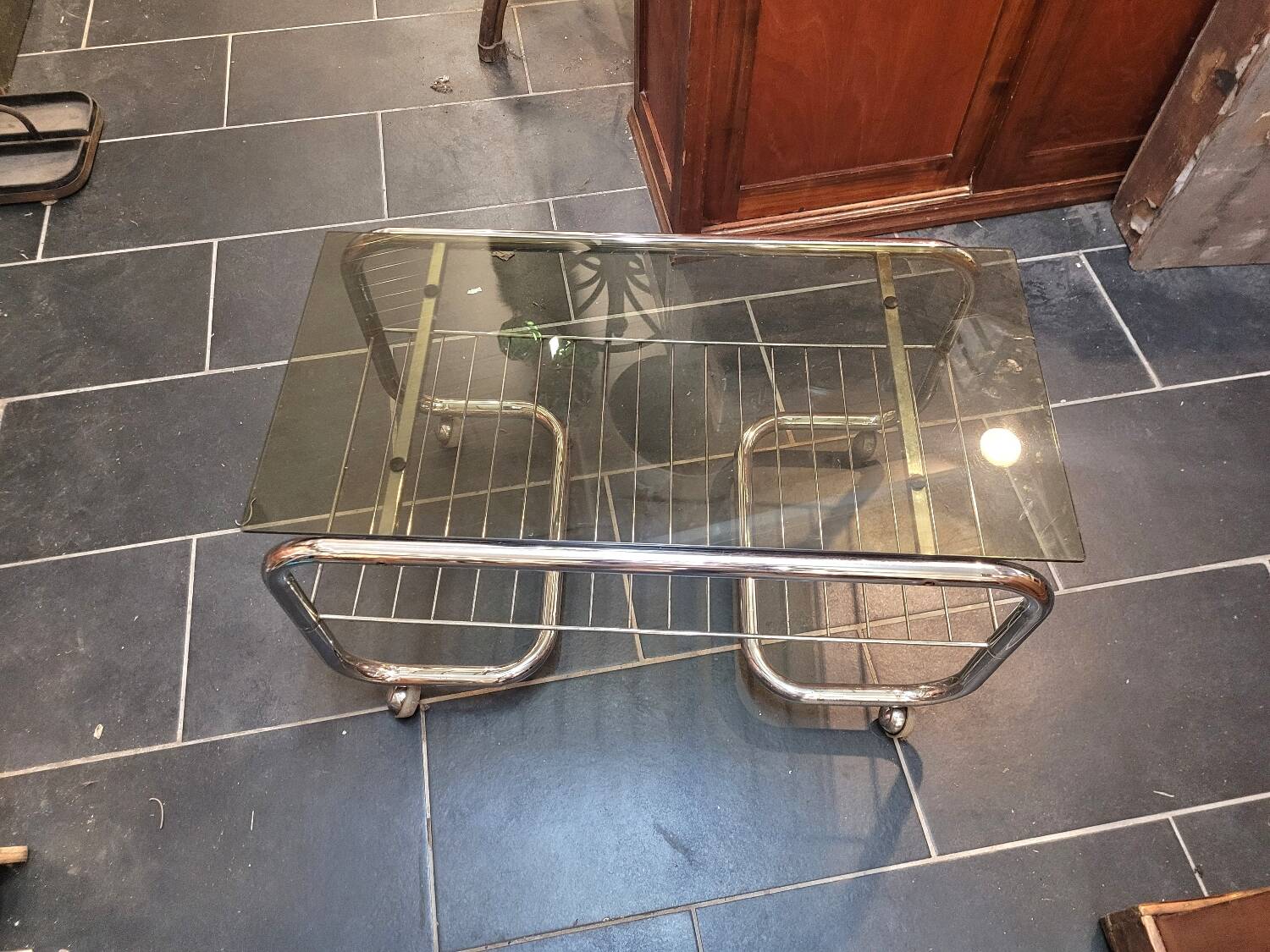 Coffee table with chrome base and smoked glass from the 70s