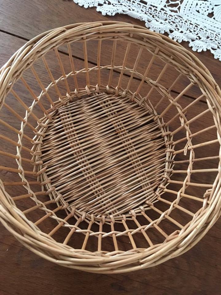 Three natural wicker baskets