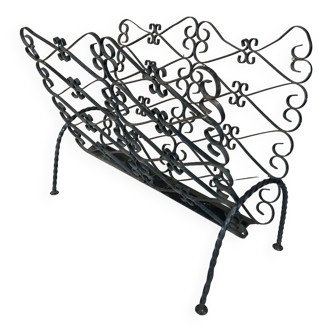 Old wrought iron magazine rack