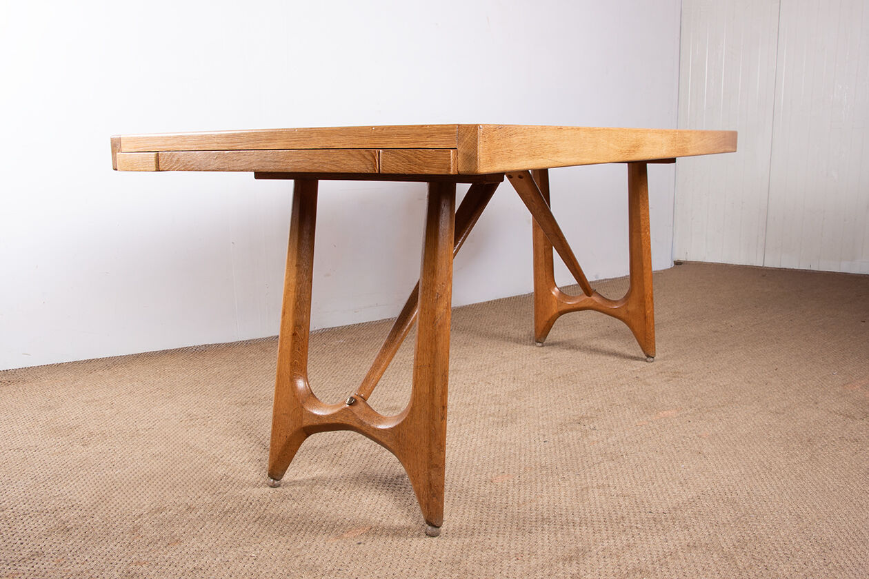 Large extendable dining table in oak by Guillerme and Chambron 1960.