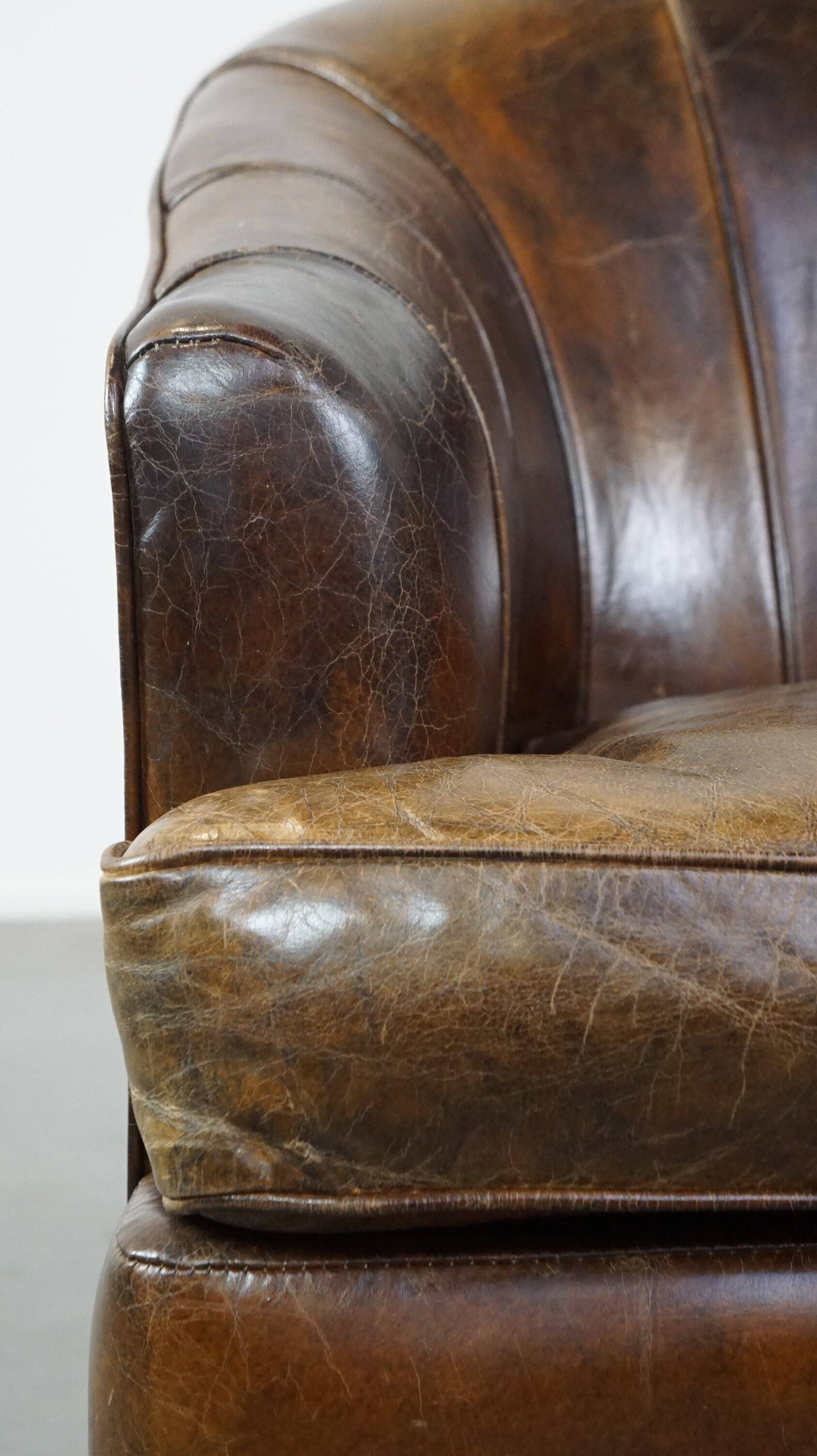 Stylish armchair with a unique design and beautiful finish, made of leather