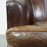 Stylish armchair with a unique design and beautiful finish, made of leather