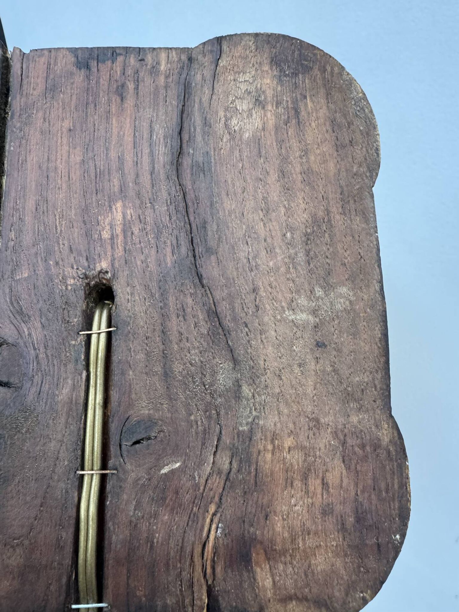 Sculpted wooden lamp with faces, antique.