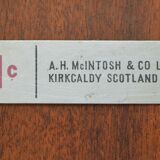 Round teak dinning table and chairs by Mctintosh