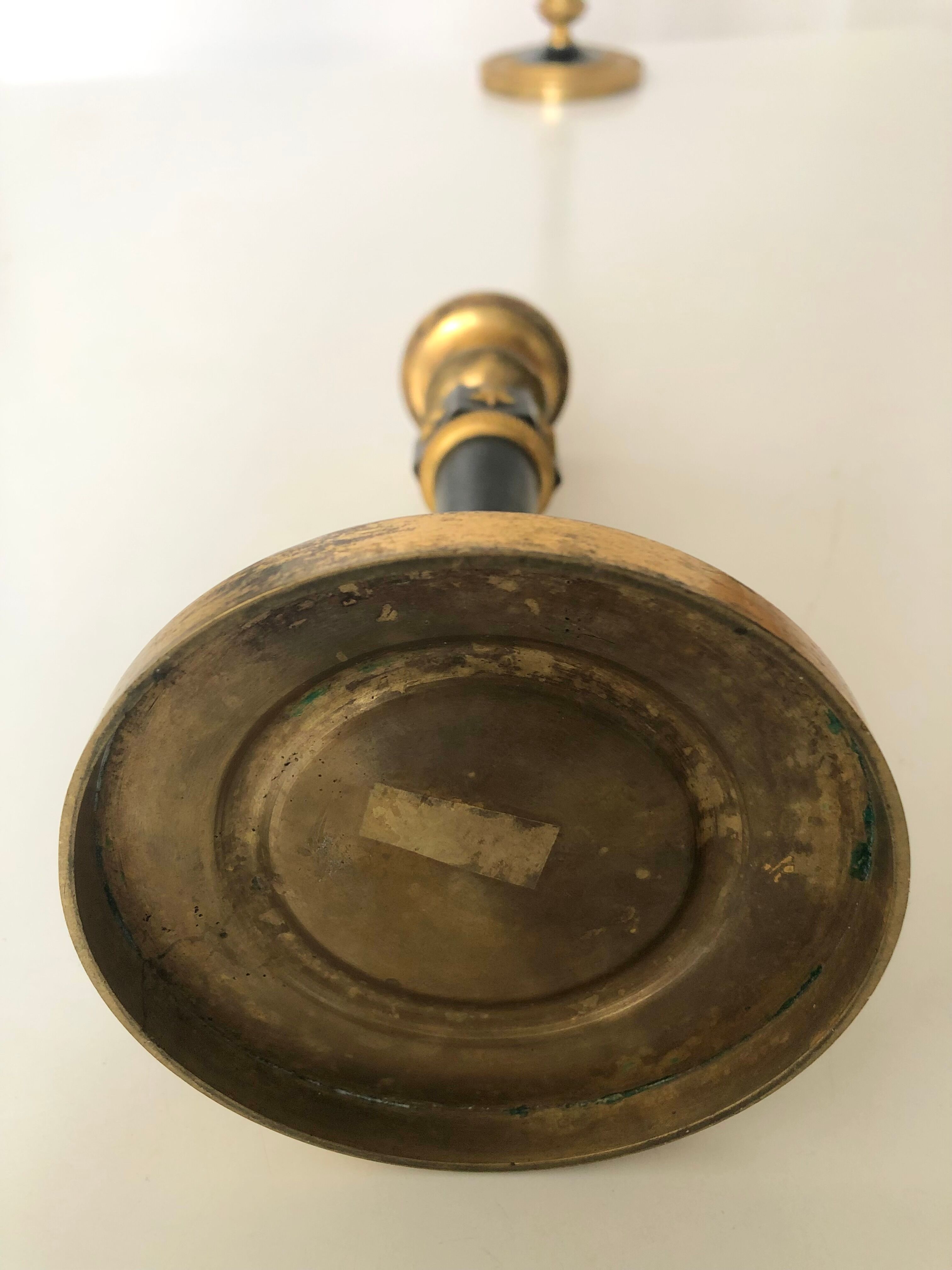 Pair of bronze candle holders empire era