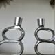 Paire de bougeoirs "cercles" en aluminium 1980