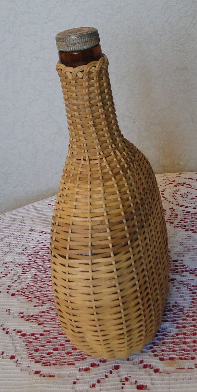 Vintage wicker covered flat bottle