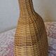 Vintage wicker covered flat bottle