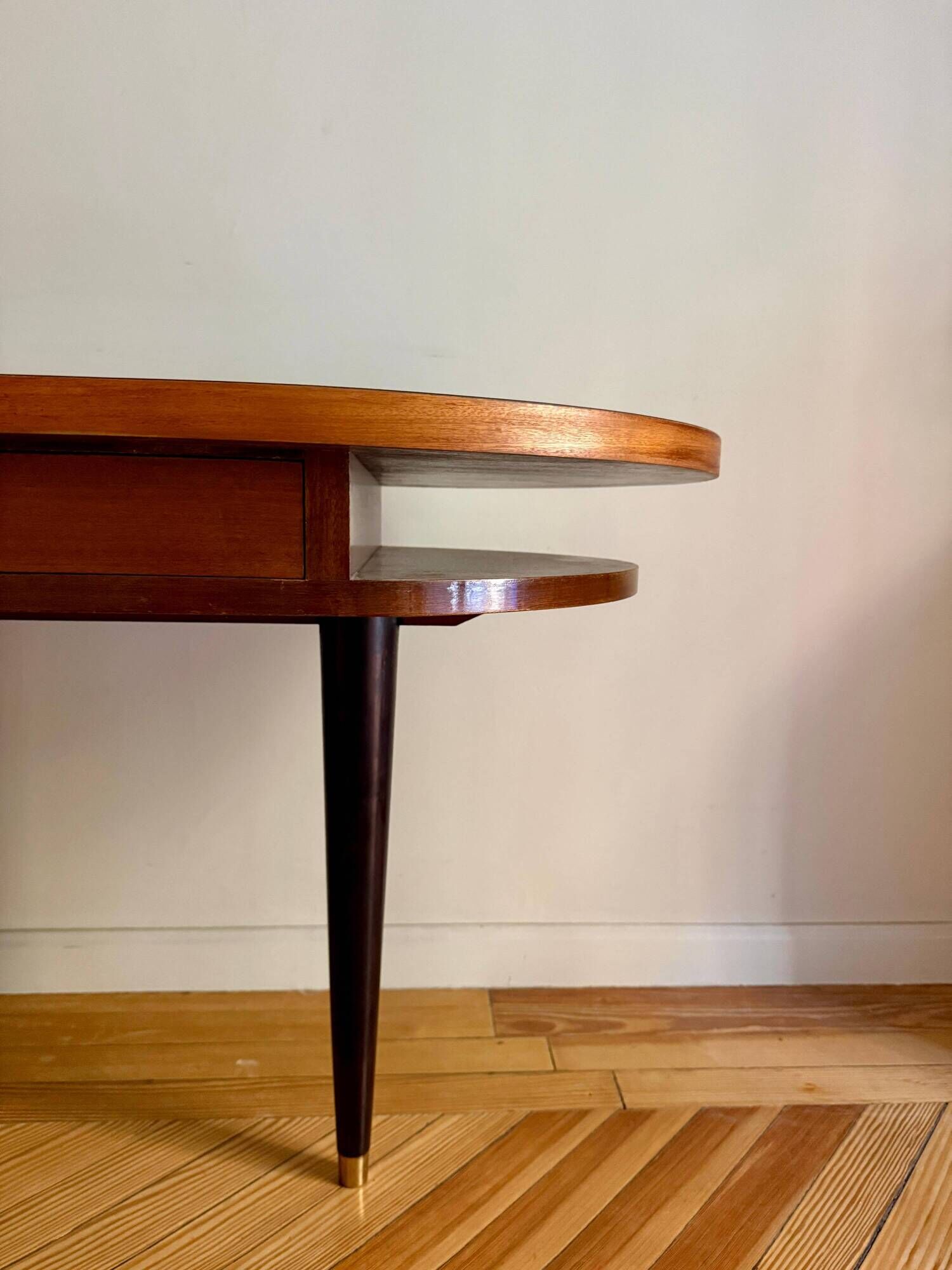 French desk "Prouve" in walnut, bronze and rubber from the 1970s.