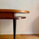 French desk "Prouve" in walnut, bronze and rubber from the 1970s.