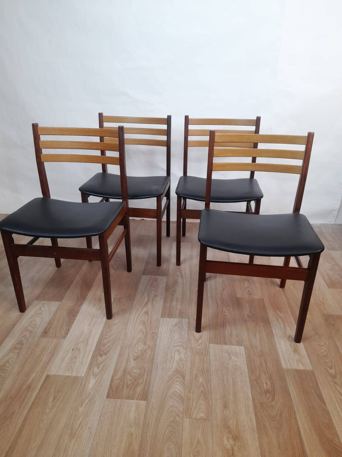 Set of 4 Scandinavian chairs in teak and black leatherette – Denmark 1960