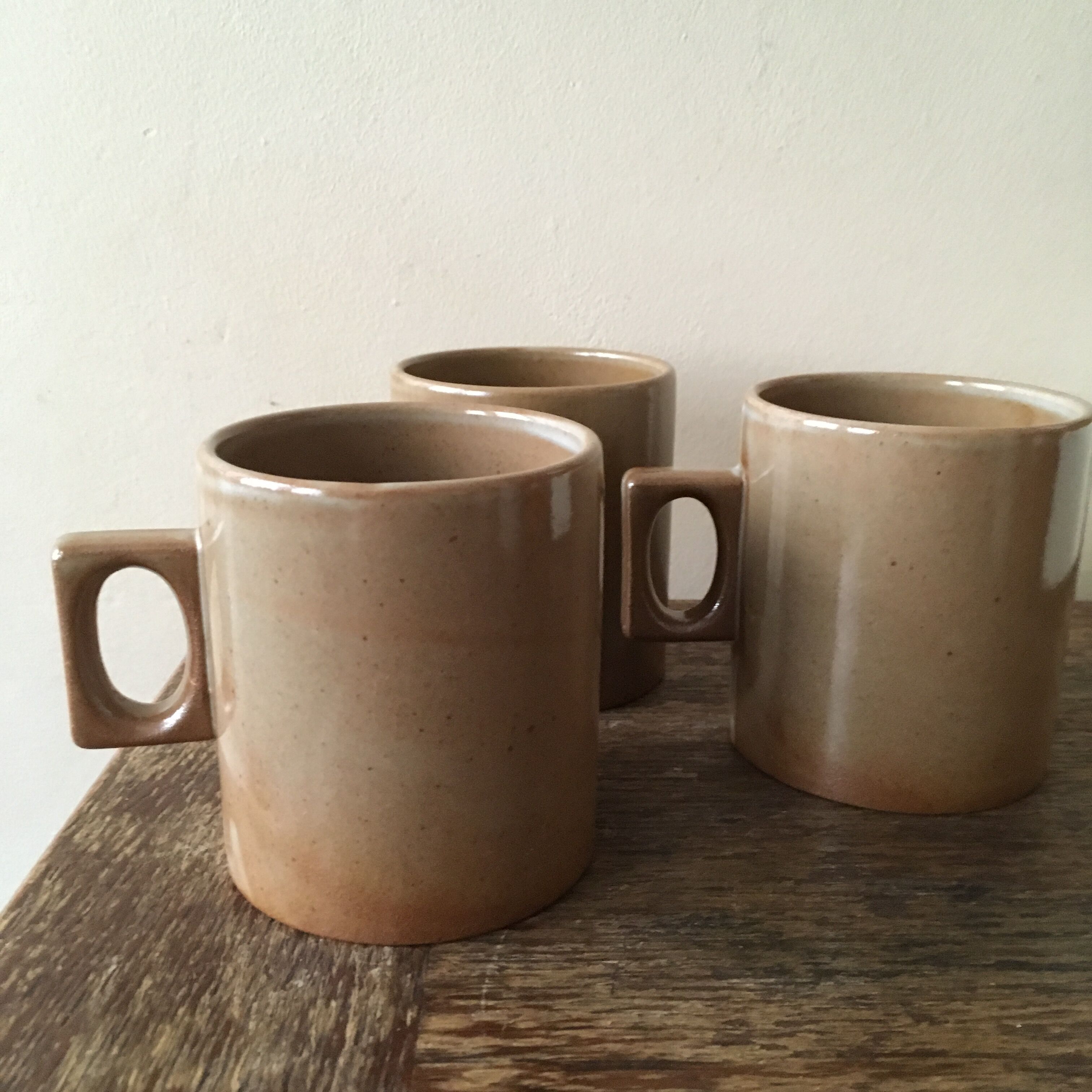 Lot of three cups or mugs stoneware of great fire of Brenne, France