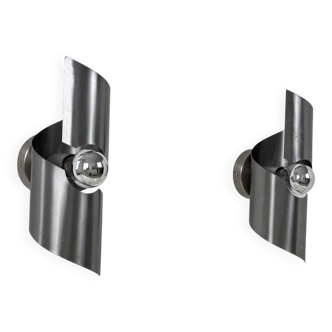 Pair of vintage wall lights, curved patinated steel, France, 1970.