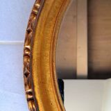 Round golden mirror